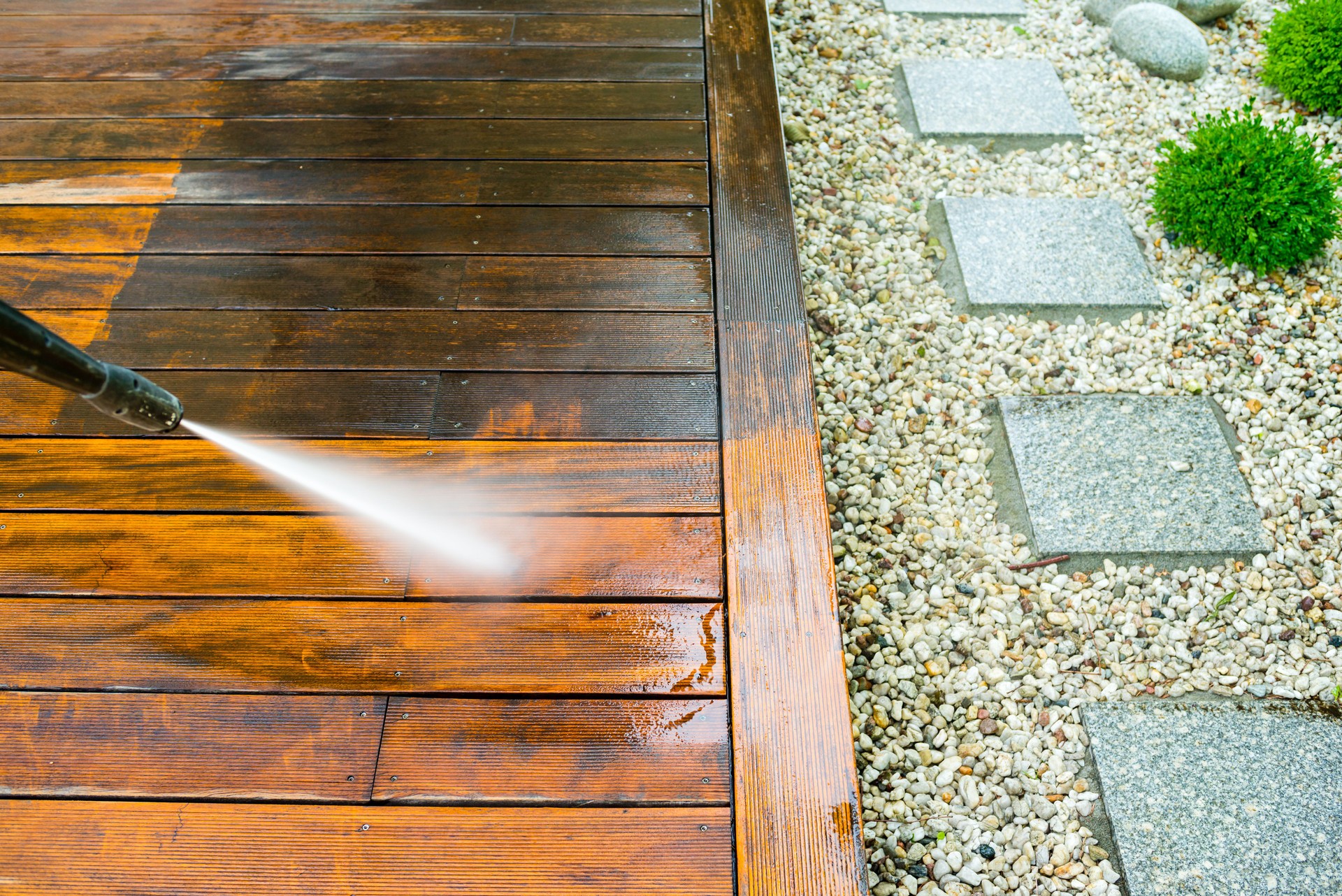 cleaning terrace with a pressure washer